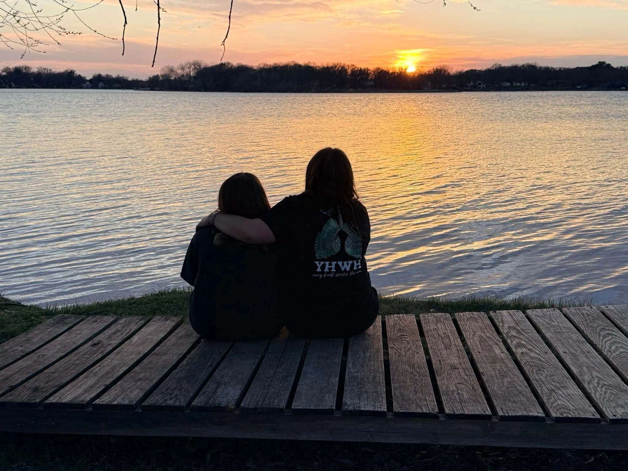 Mel and Addy at sunset on the dock
